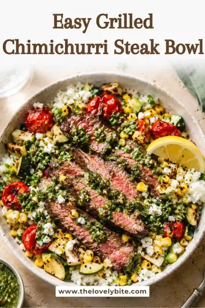 A Grilled Chimichurri Steak Bowl filled with sliced grilled flank steak, charred corn, zucchini, cherry tomatoes, fluffy rice, and vibrant homemade chimichurri sauce. Fresh herbs add a colorful finishing touch.