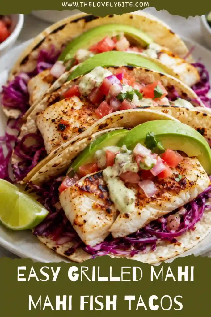 Healthy grilled fish tacos filled with flaky mahi mahi, homemade slaw, avocado, and fresh salsa. Perfect for easy weeknight dinners and summer entertaining.