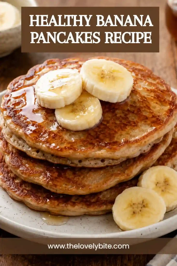 Whole wheat Healthy Banana Pancakes served with fresh berries, banana slices, and a drizzle of maple syrup for a wholesome breakfast.