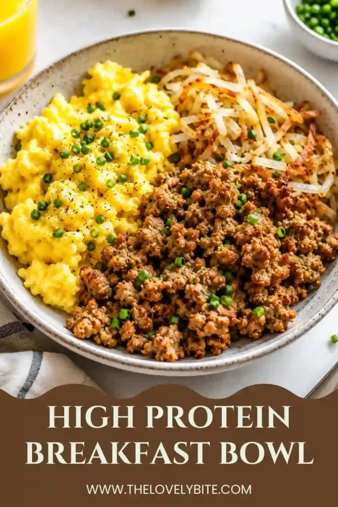 An easy High Protein Breakfast Bowl topped with fluffy eggs, lean ground turkey, crispy hash browns, avocado, and fresh parsley. This healthy breakfast recipe offers balanced nutrition and bold flavors in every bite.