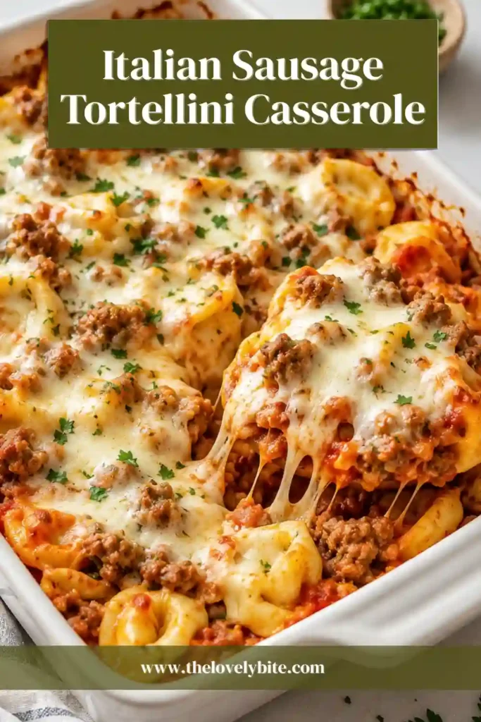Close-up of a cheesy baked tortellini casserole served with melted mozzarella and Parmesan cheese. A comforting weeknight dinner everyone will enjoy.