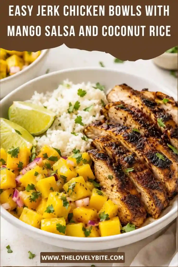 Colorful Jerk Chicken Bowls made with seasoned chicken, coconut rice, mango salsa, fresh cilantro, and lime wedges. A delicious Caribbean-inspired meal.
