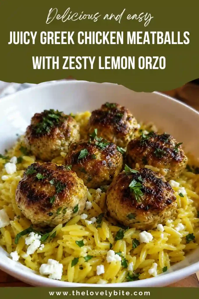 Fresh Greek chicken meatballs resting on fluffy lemon orzo and topped with crumbled feta cheese and chopped parsley. A wholesome Mediterranean comfort meal.