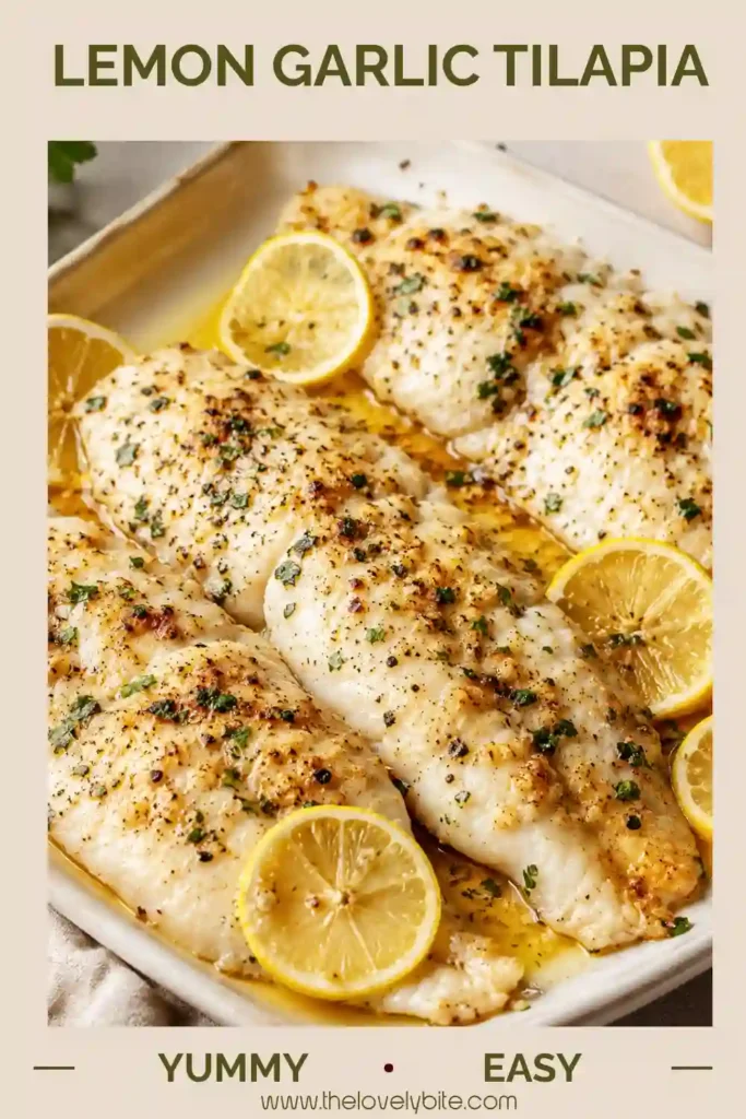 Close-up of flaky baked tilapia covered in garlic butter, parsley, and fresh lemon juice. This healthy fish recipe is light, flavorful, and easy to prepare.