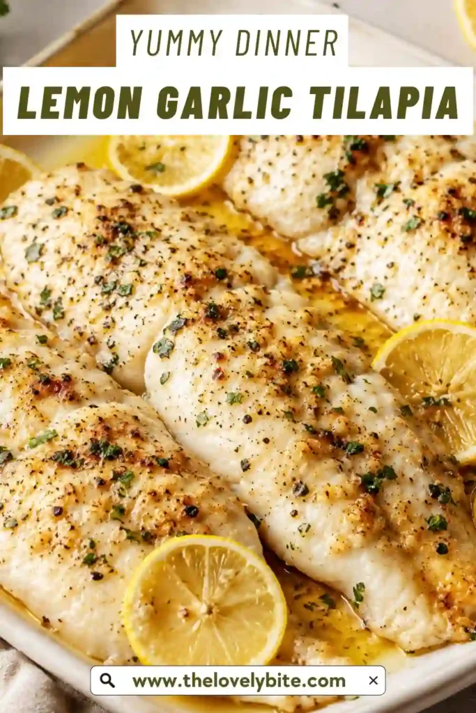Fresh Lemon Garlic Tilapia served with roasted vegetables and lemon wedges. The baked fish is tender, juicy, and garnished with herbs for a healthy seafood dinner.