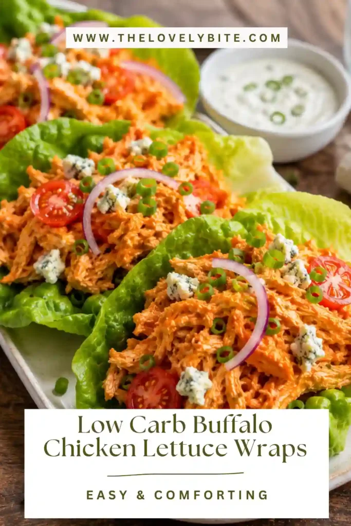 A platter of Low Carb Buffalo Chicken Lettuce Wraps filled with spicy shredded chicken, cherry tomatoes, red onion, and creamy avocado. This healthy keto-friendly meal is colorful, fresh, and perfect for lunch.