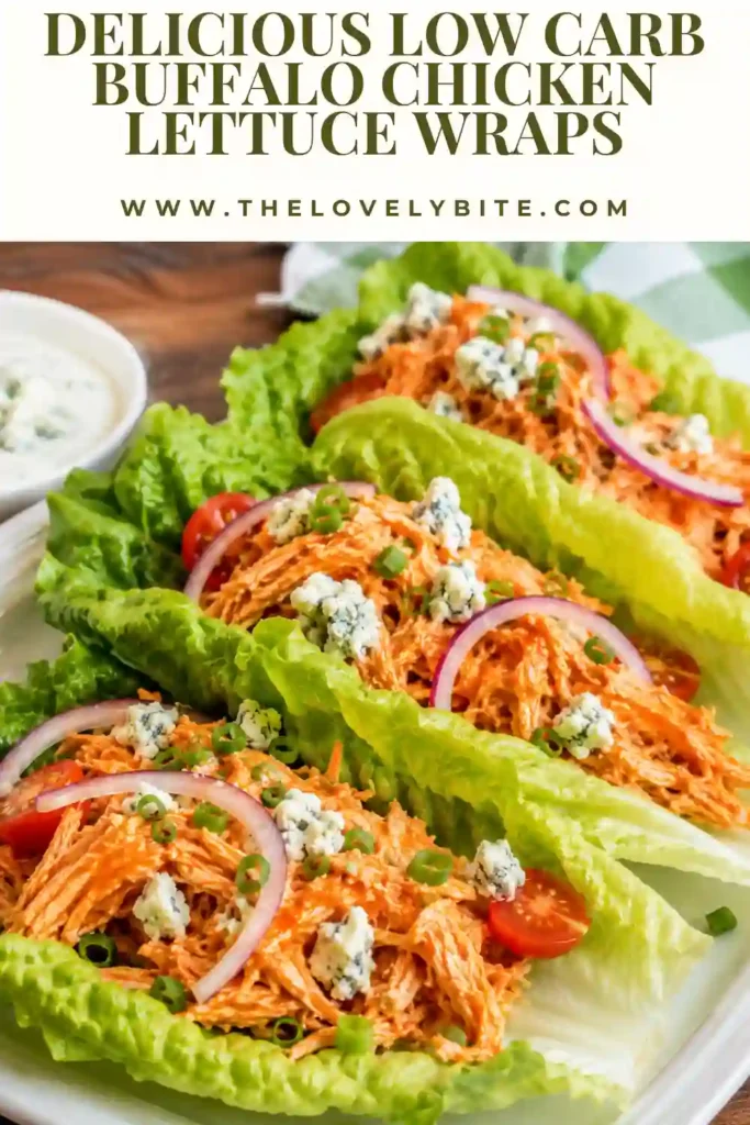 Healthy Buffalo Chicken Lettuce Wraps arranged on a serving tray with avocado slices and fresh vegetables. This easy low carb lunch is naturally gluten-free and keto-friendly.