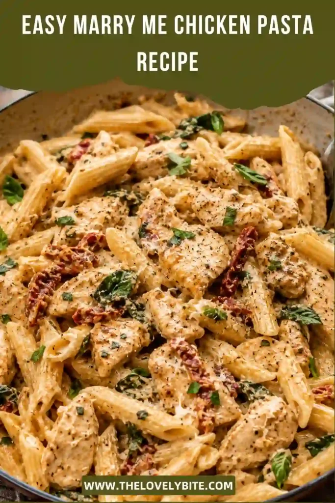 Close-up of creamy parmesan chicken pasta topped with fresh basil and grated cheese. This easy chicken pasta recipe is perfect for comforting family dinners.