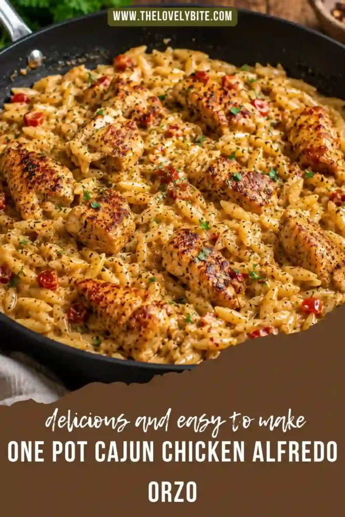Close-up of One Pot Cajun Chicken Alfredo Orzo with golden chicken pieces and creamy Parmesan sauce. A comforting homemade pasta dinner perfect for busy weeknights.