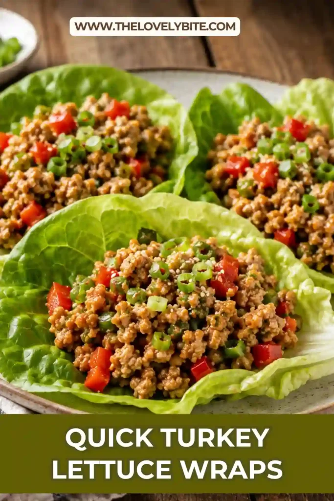 A plate of Quick Turkey Lettuce Wraps filled with seasoned ground turkey, crunchy water chestnuts, and diced red peppers inside crisp butter lettuce leaves. This healthy low carb dinner is colorful, fresh, and perfect for weeknight meals.