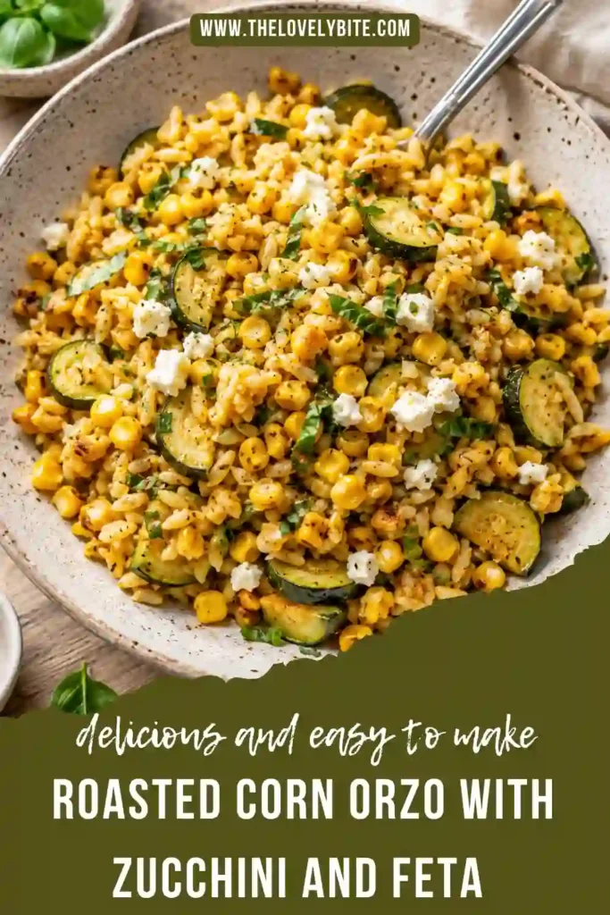 . Golden roasted corn and tender zucchini mixed with orzo pasta, feta cheese, and chopped basil create a colorful vegetarian meal. The bright flavors make it ideal for lunch or dinner.