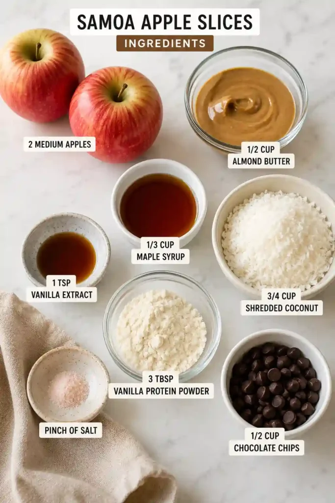 Close-up of homemade Samoa Apple Slices with creamy coconut topping and glossy chocolate drizzle on crisp apple rings. A healthy dessert that's quick and easy to prepare.
