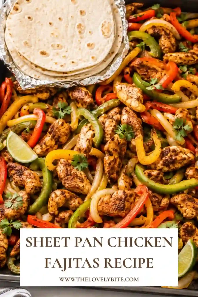 A tray of Sheet Pan Chicken Fajitas with roasted chicken strips, colorful bell peppers, and onions served with warm flour tortillas. Fresh cilantro and lime add vibrant flavor to this easy Tex-Mex dinner.