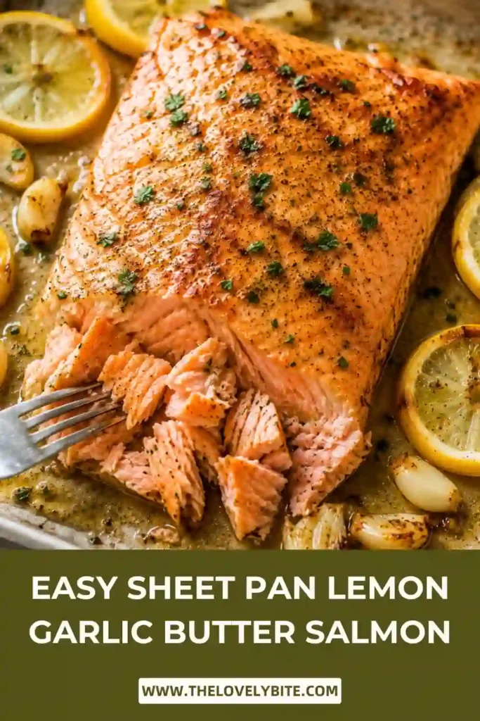 Tender oven baked salmon with lemon garlic butter served directly from a foil-lined sheet pan. The salmon is juicy, flaky, and perfect for weeknight meals.