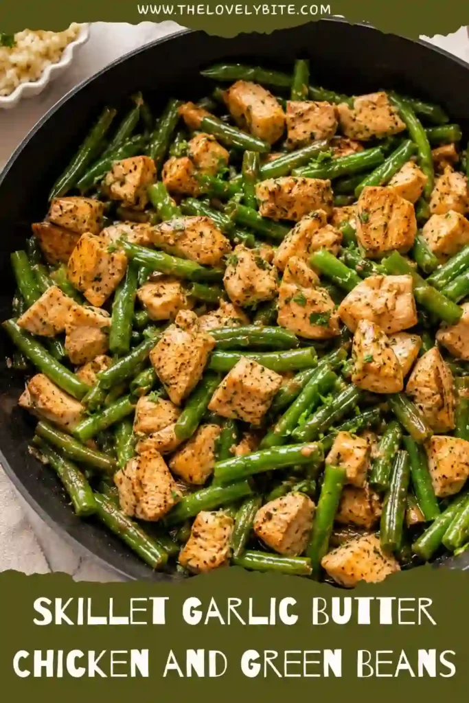 Freshly cooked chicken breast pieces tossed with green beans in a buttery garlic sauce inside a cast-iron skillet. This easy chicken skillet recipe is packed with flavor and fresh ingredients.