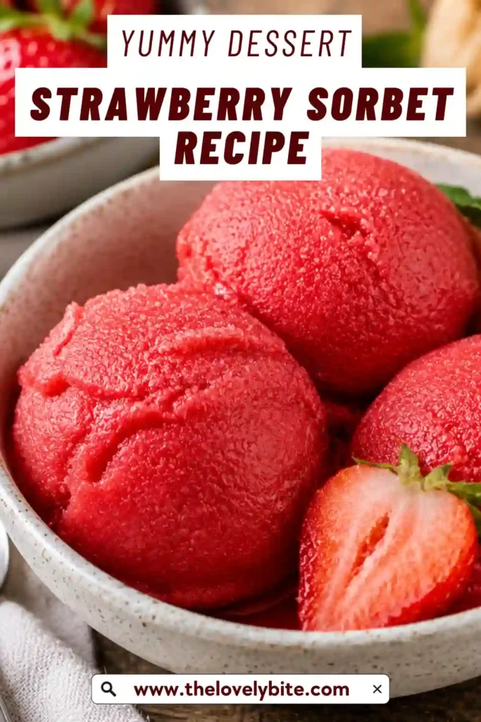 A bowl of homemade Strawberry Sorbet made with fresh ripe strawberries. The smooth dairy-free sorbet is garnished with fresh berries and mint for a refreshing summer dessert.