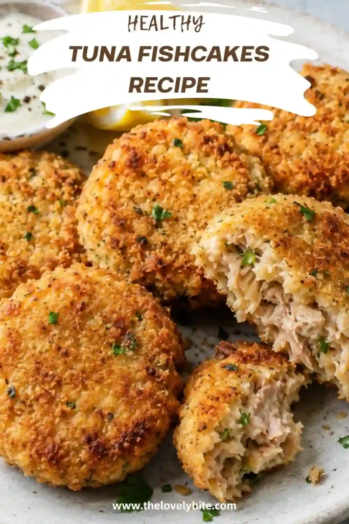 Crispy homemade tuna fishcakes with tender potato filling served alongside a fresh green salad. A simple canned tuna recipe for the whole family.