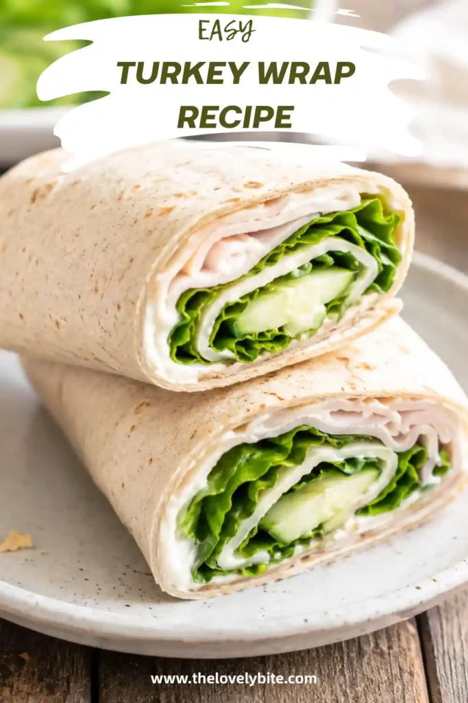 Turkey Wrap Recipe filled with sliced turkey, avocado, cucumber, lettuce, and cream cheese wrapped in a whole wheat tortilla.