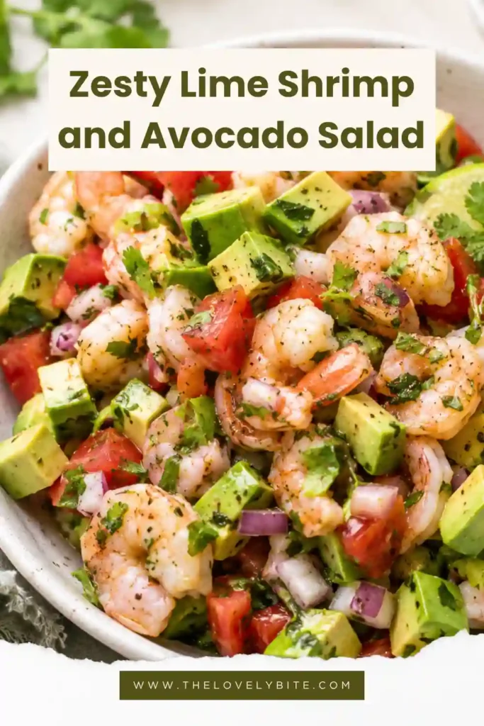 Close-up of a healthy shrimp salad made with avocado, tomato, jalapeño, cilantro, and fresh lime dressing. This low carb salad is vibrant and refreshing.