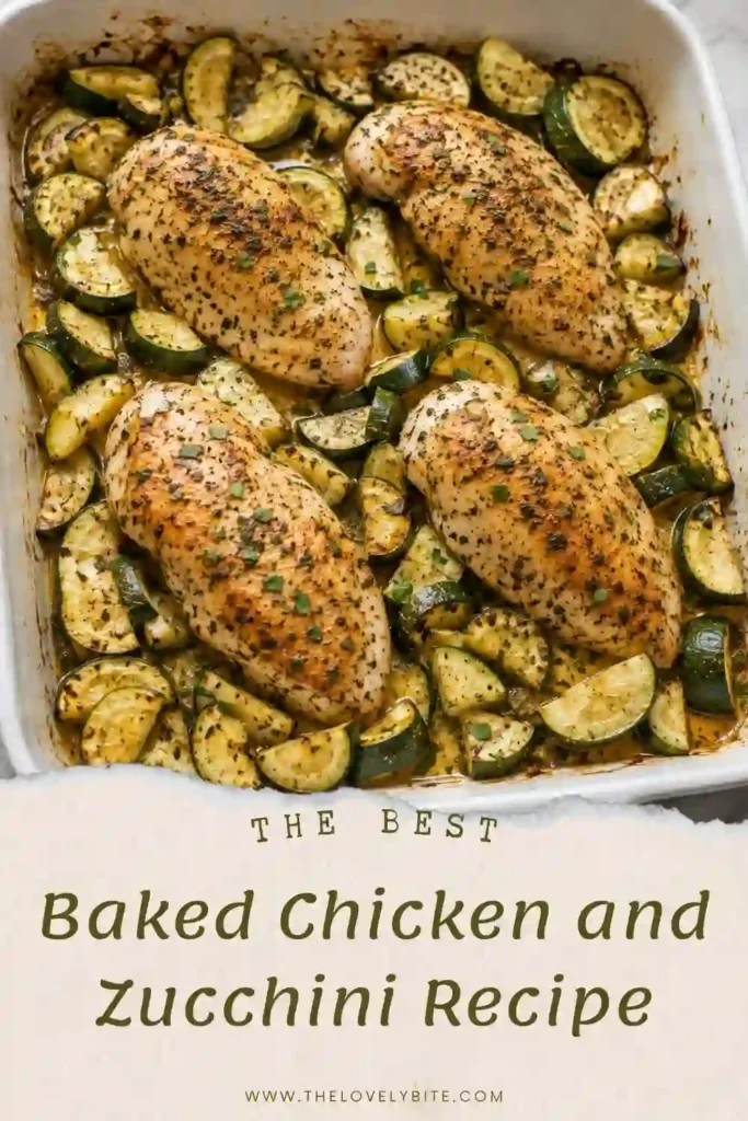 Oven baked chicken pieces served with tender zucchini and roasted onion in a simple baking dish. The colorful chicken and vegetables are seasoned with paprika, oregano, cumin, and garlic.