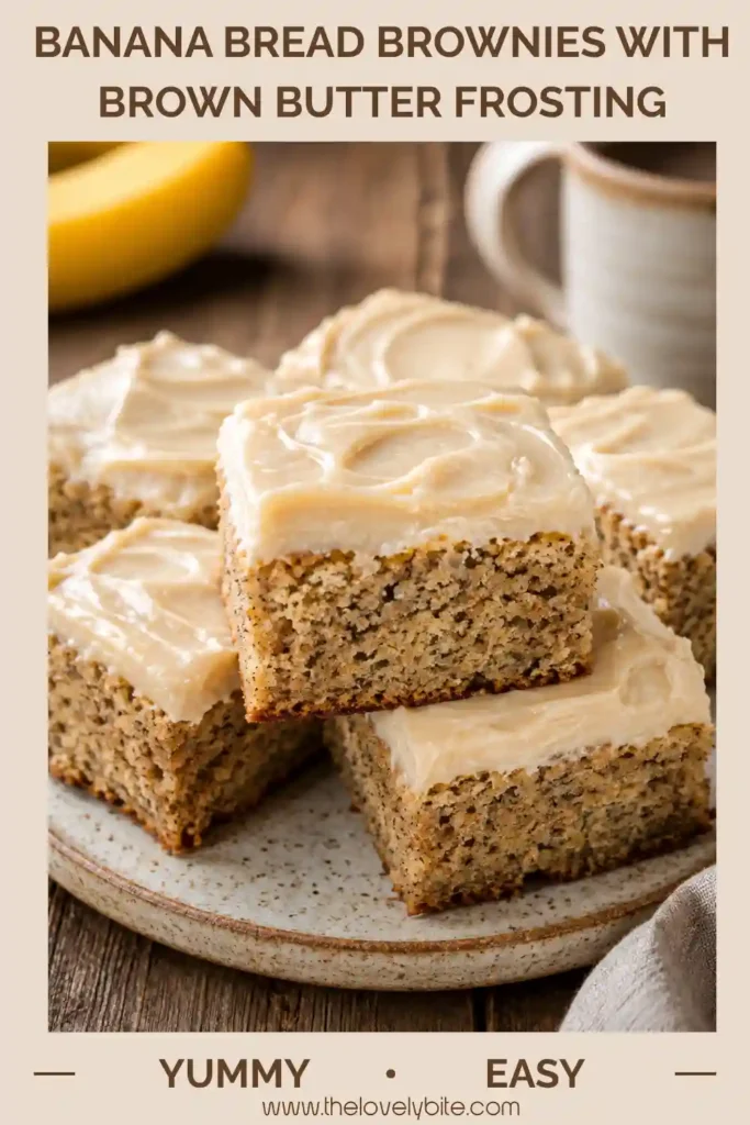 2. Moist Banana Bread Brownies arranged on a serving plate with smooth brown butter frosting. Ripe bananas give the soft dessert bars plenty of sweet banana flavor.