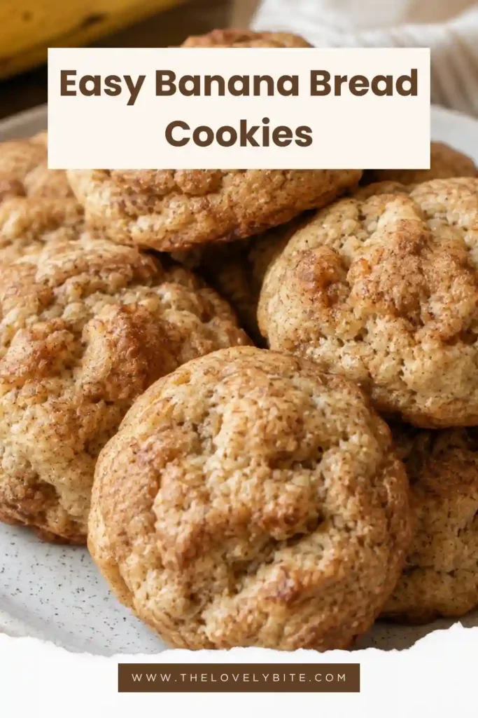Homemade Banana Bread Cookies made with mashed ripe bananas, brown sugar and cinnamon. One cookie is broken open to show the soft, tender interior.