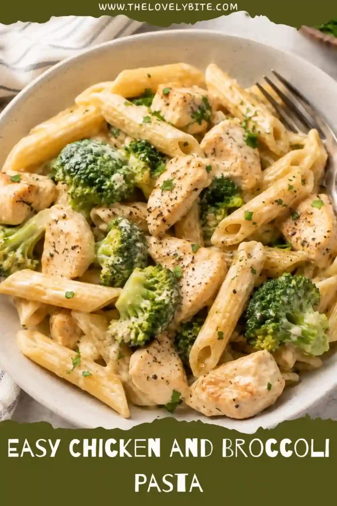 Creamy Chicken and Broccoli Pasta served in a white bowl with fresh broccoli, golden chicken, Parmesan cheese, and lemon garnish. An easy family-friendly comfort meal.