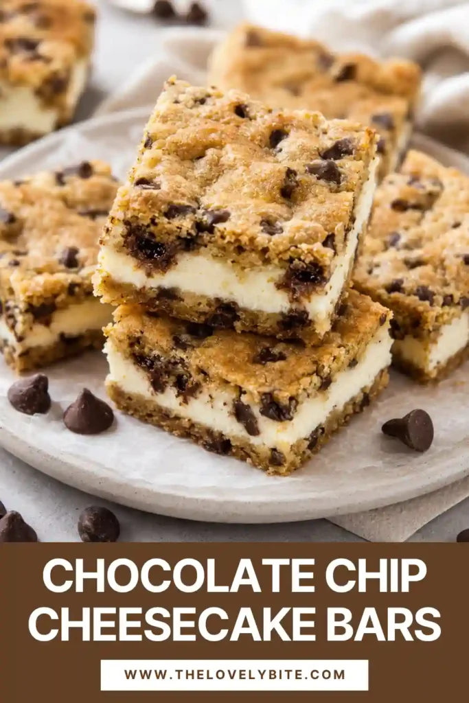 Chocolate chip cookie cheesecake bars featuring soft cookie dough surrounding a smooth cream cheese filling. Golden edges and melted chocolate chips contrast with the pale cheesecake layer.