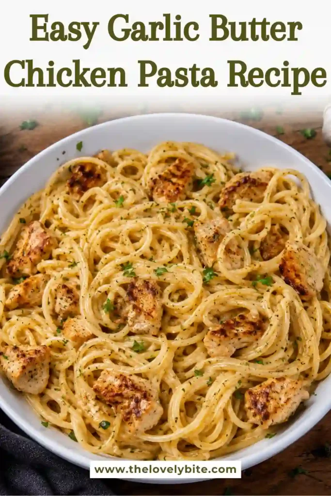 A bowl of Garlic Butter Chicken Pasta topped with grated Parmesan cheese and fresh parsley. Tender chicken pieces are coated in a creamy garlic butter sauce with perfectly cooked spaghetti.