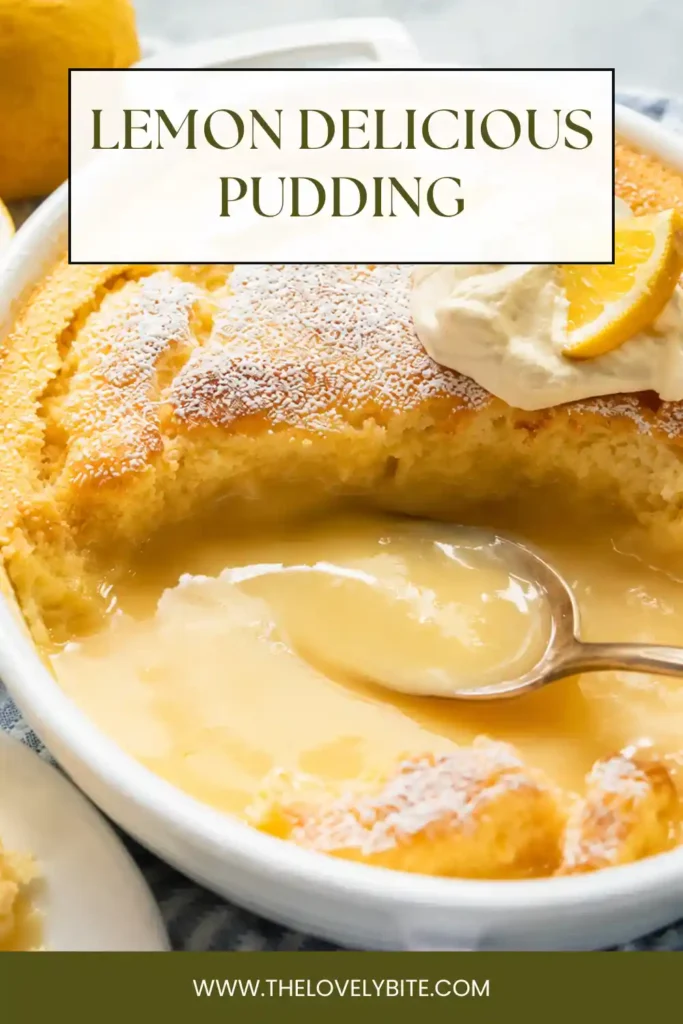 Warm lemon custard pudding served in an individual ramekin with a golden baked surface. The fluffy pudding is accompanied by creamy whipped topping and fresh lemon garnish.