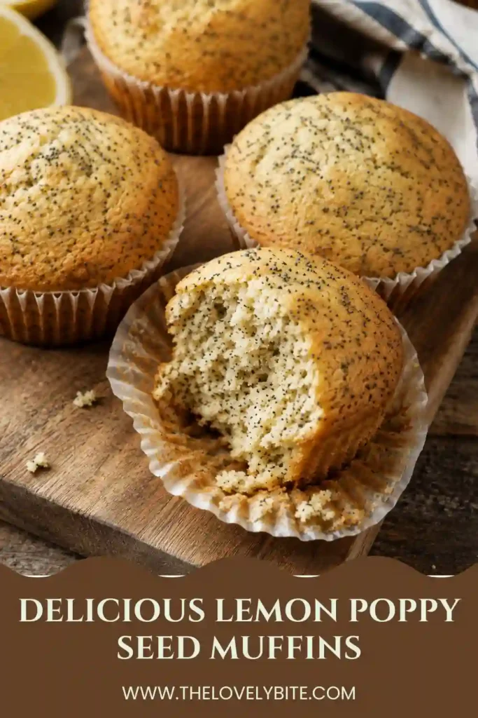 Freshly baked Lemon Poppy Seed Muffins with golden tops cooling on a wire rack. The muffins are brushed with homemade lemon syrup for extra moisture and citrus flavor.