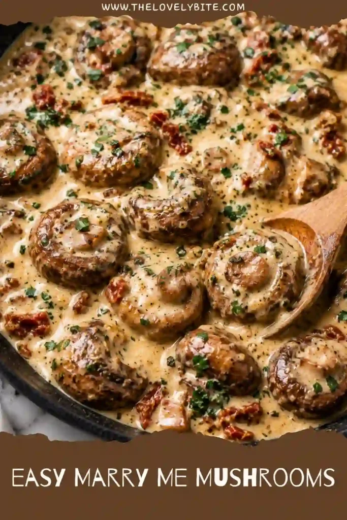 Marry Me Mushrooms served over creamy mashed potatoes with a rich Parmesan sauce and sun-dried tomatoes. Fresh basil and red pepper flakes finish the dish.