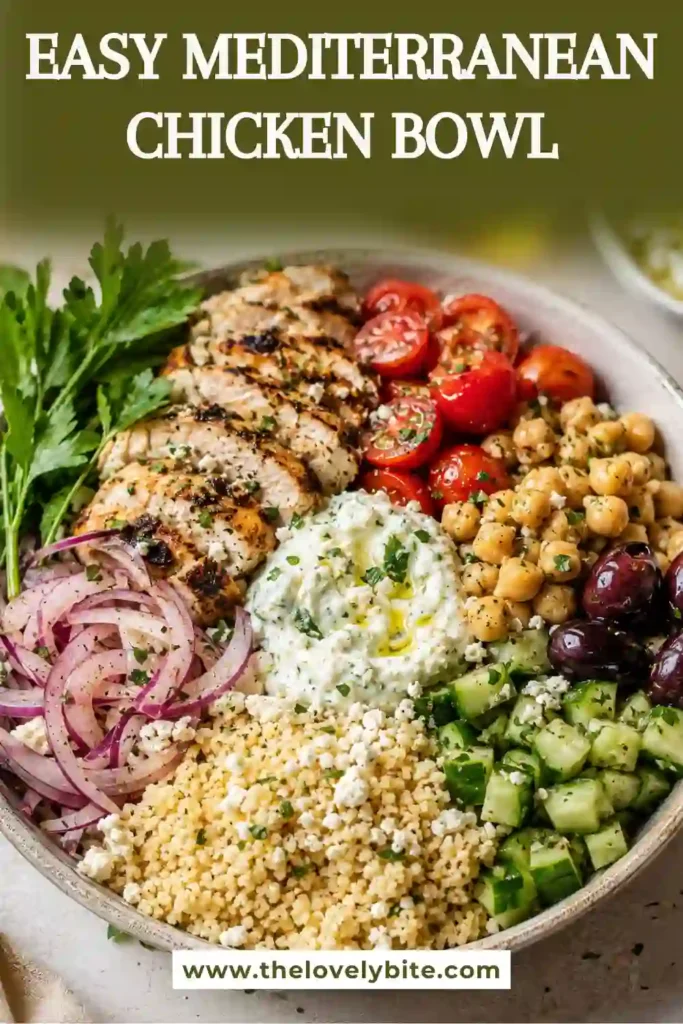 Fresh Mediterranean Chicken Bowl featuring juicy chicken breast, cherry tomatoes, cucumbers, chickpeas, olives, couscous, and homemade tzatziki served in a rustic bowl. Perfect for meal prep and healthy lunches.