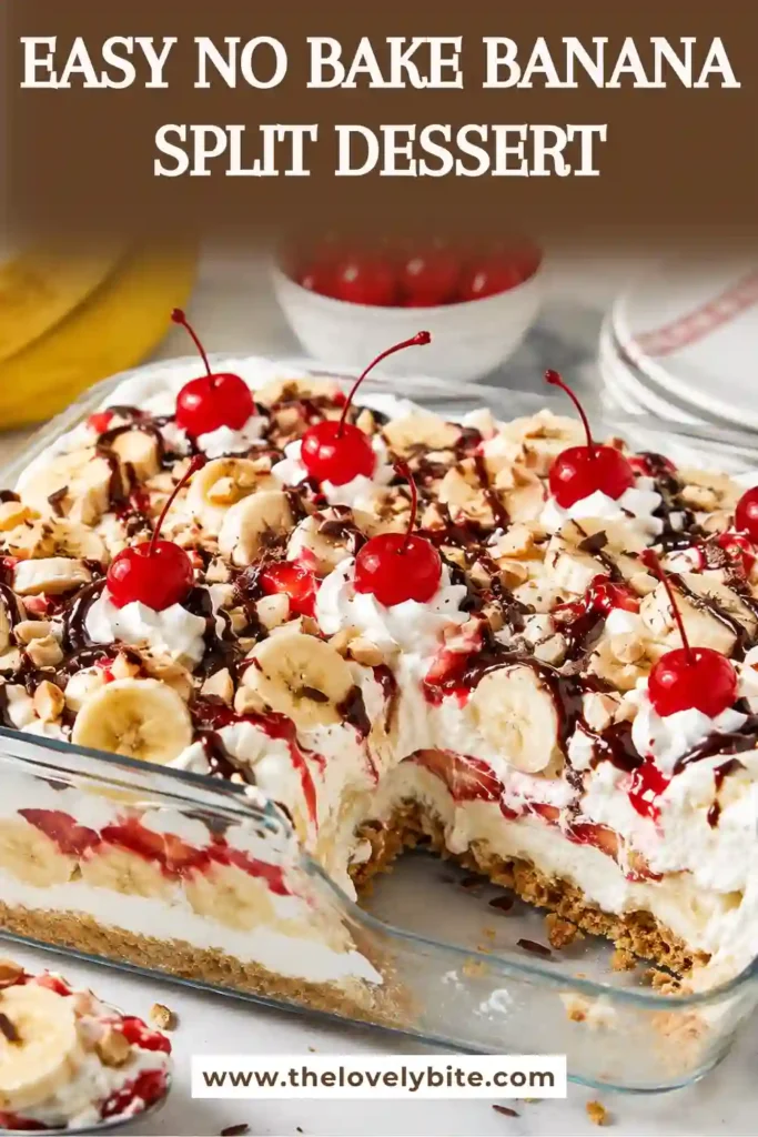 A chilled slice of banana split dessert with fresh strawberries, bananas, pineapple, whipped topping, and chocolate syrup served on a dessert plate.