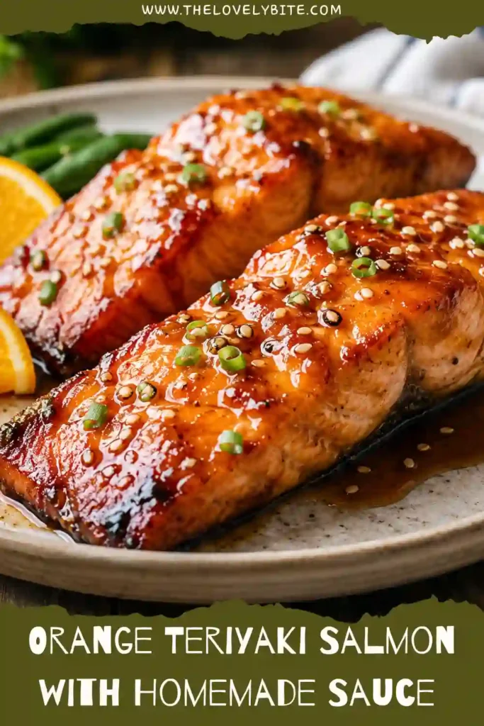 1. Orange Teriyaki Salmon glazed with a glossy homemade orange teriyaki sauce and topped with sesame seeds and green onions. The baked salmon has tender centers and caramelized golden edges.