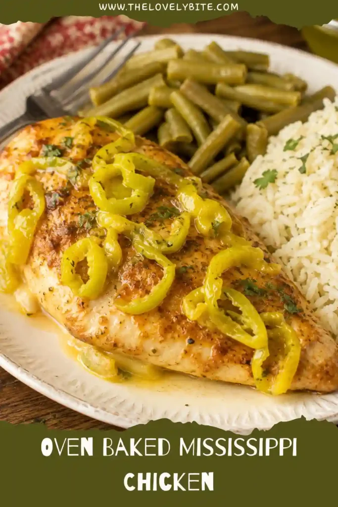 Oven Baked Mississippi Chicken breasts topped with sliced pepperoncini and coated in buttery ranch pan sauce. The tender baked chicken is served hot in a rustic baking dish.