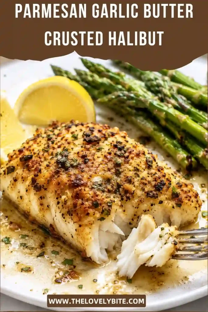 Close-up of crispy baked halibut topped with Parmesan, garlic, herbs, and lemon. This easy baked halibut recipe is golden, flaky, and full of rich buttery flavor.