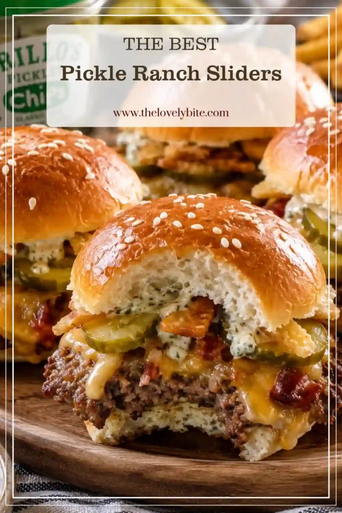 Homemade Pickle Ranch Sliders with seasoned ground beef, melted Colby Jack cheese, turkey ham, dill pickles, and ranch sauce. The sliders are baked until the Hawaiian rolls are warm, golden, and buttery.