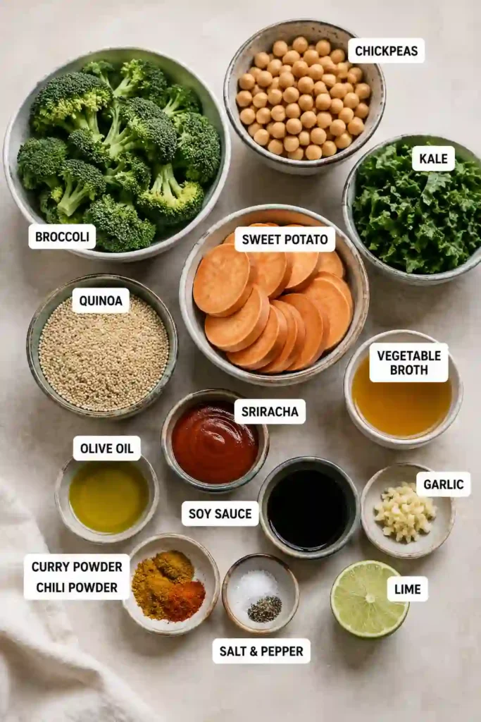 A colorful Roasted Veggie Quinoa Bowl filled with roasted broccoli, curry sweet potatoes, quinoa, chickpeas, and chili-lime kale. This healthy quinoa bowl is vibrant, nutritious, and perfect for meal prep.
