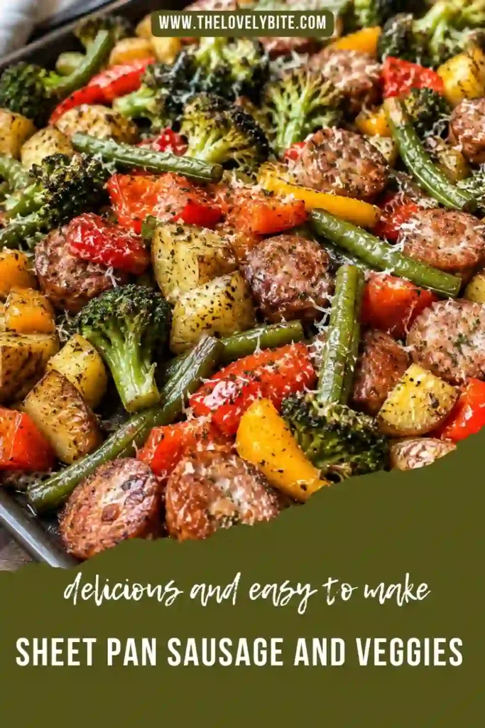 Close-up of roasted vegetables and smoked beef sausage seasoned with herbs and spices on a sheet pan. The potatoes are crispy while the vegetables remain tender.