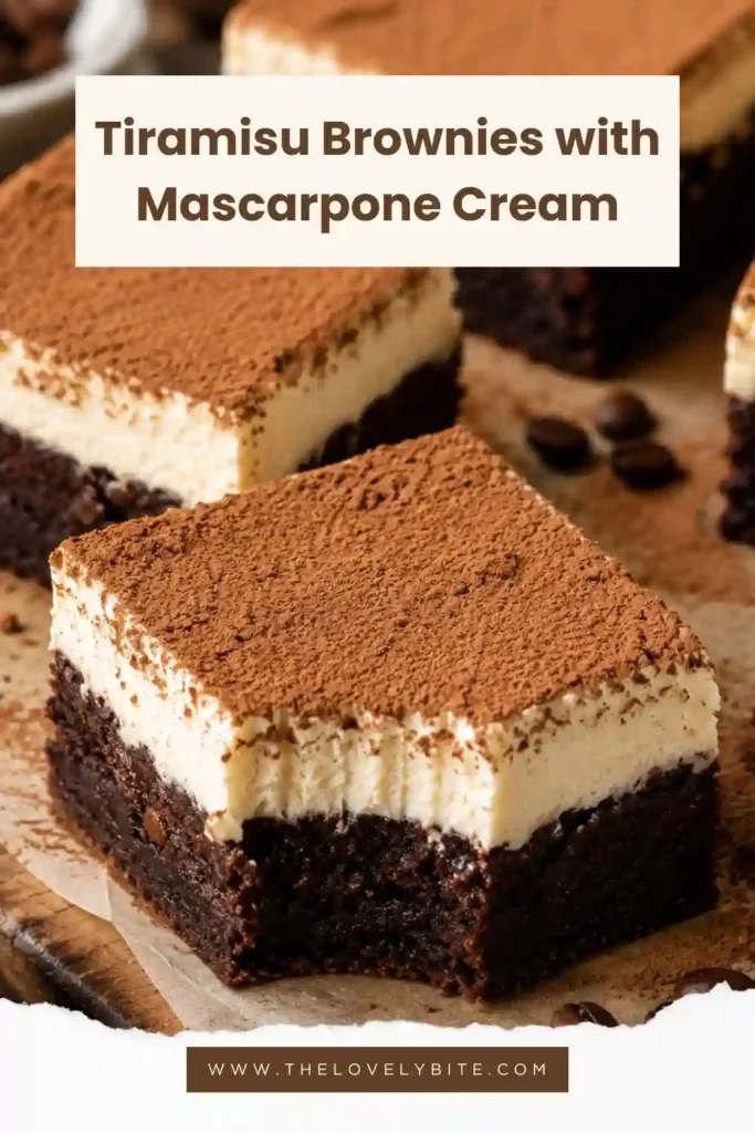 A square pan of mascarpone brownies topped with creamy coffee-flavored mascarpone and cocoa powder. The brownies have a rich, dark chocolate base with a soft fudgy texture.