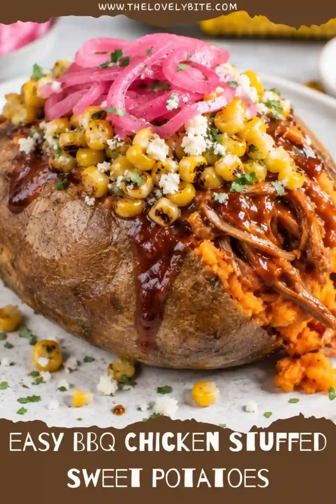 BBQ Chicken Stuffed Sweet Potatoes arranged on a serving plate with colorful toppings. The sweet potato dinner features tender baked potatoes, saucy chicken, cilantro, and pickled onions.