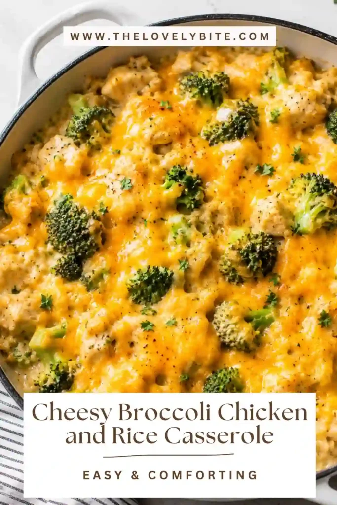 Close-up of cheesy broccoli chicken and rice casserole showing tender chicken, fluffy rice, green broccoli, and melted cheddar. The casserole has a rich golden cheese topping and a creamy texture.