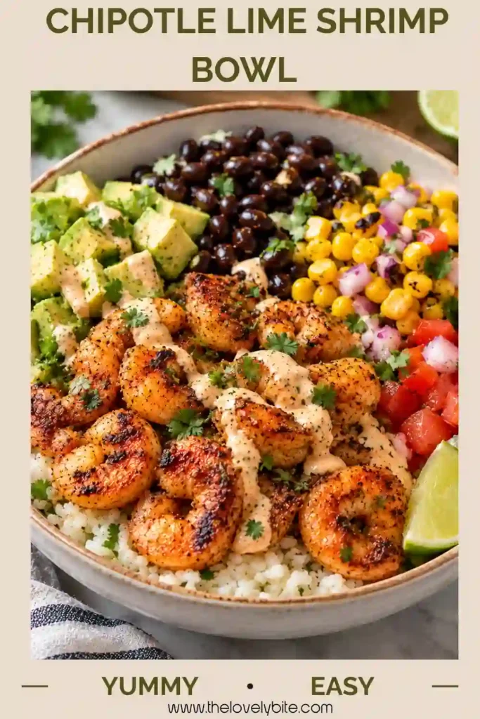 Close-up of juicy chipotle lime shrimp served over fluffy rice with creamy avocado, fresh vegetables, and a tangy homemade dressing. This healthy shrimp bowl combines smoky spices, bright citrus, and colorful toppings.