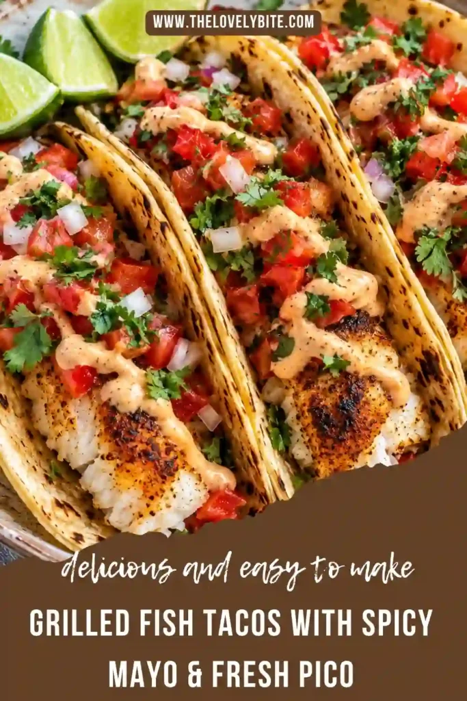 Close-up of Grilled Fish Tacos with Spicy Mayo drizzled over tender seasoned fish and fresh vegetables. Juicy pico de gallo, crisp cabbage, and soft tortillas create a colorful taco filling.