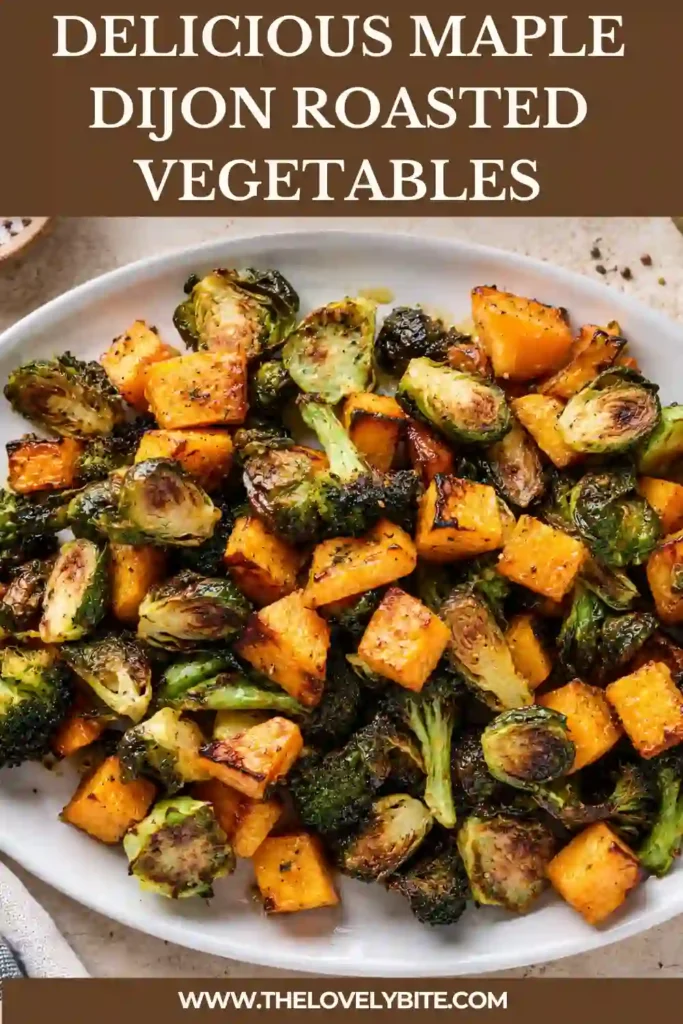 Dijon roasted vegetables served warm with golden butternut squash, browned Brussels sprouts, broccoli, and crunchy pecans. The maple Dijon glaze adds a glossy finish to this healthy vegetable side dish.