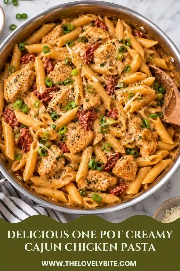 A skillet of creamy Cajun chicken pasta filled with tender chicken, penne, and a rich orange-red cream cheese sauce. Freshly sliced green onions add color to this comforting one pot chicken pasta.