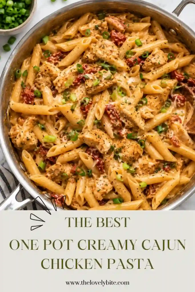 A close-up of creamy Cajun chicken penne pasta coated in a smooth, smoky cream cheese sauce. Tender chicken pieces and fire-roasted tomatoes create a rich and flavorful easy Cajun chicken pasta.