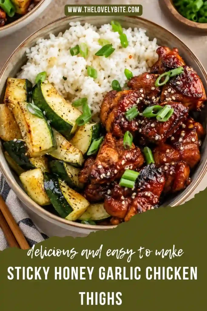 Boneless chicken thighs simmering in a skillet with a thick honey garlic sauce. The golden chicken is coated in a glossy glaze made with honey, garlic, and soy sauce.