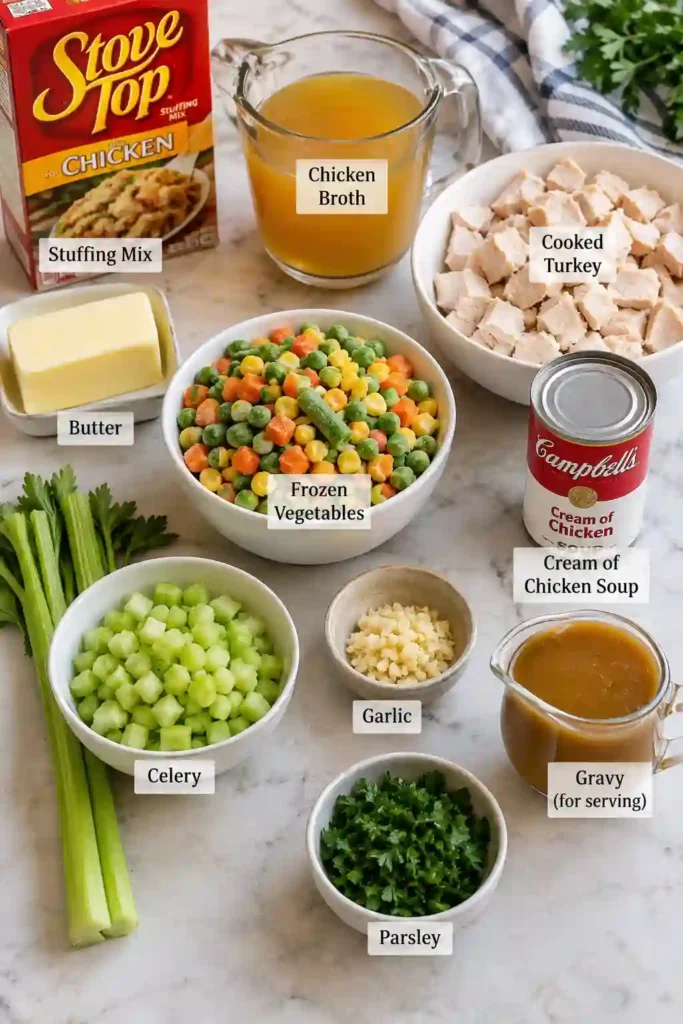 Golden turkey casserole with stuffing layered over a creamy mixture of leftover turkey and vegetables. This comforting turkey stuffing bake is an easy way to use Thanksgiving leftovers.